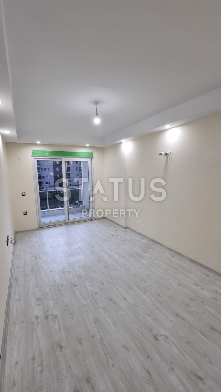 Новая двухкомнатная квартира в 600м от моря в Махмутларе. 60м2 фото 6