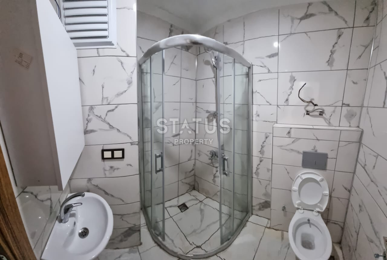 Новая двухкомнатная квартира в 600м от моря в Махмутларе. 60м2 фото 7