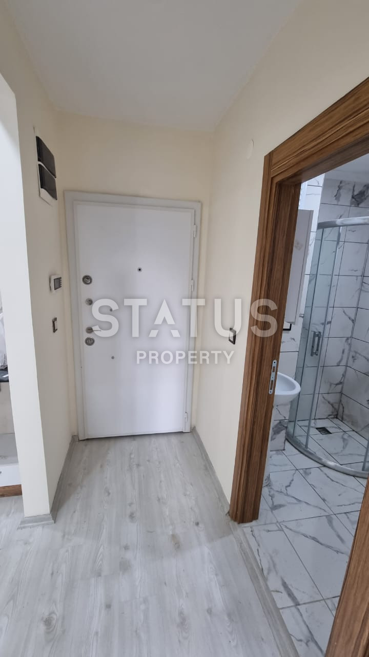 Новая двухкомнатная квартира в 600м от моря в Махмутларе. 60м2 фото 8