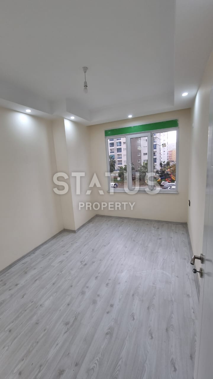 Новая двухкомнатная квартира в 600м от моря в Махмутларе. 60м2 фото 9