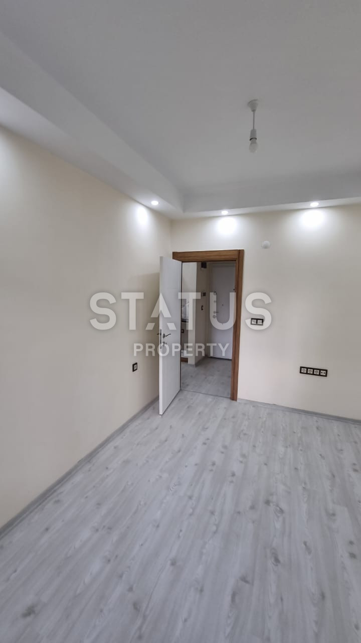 Новая двухкомнатная квартира в 600м от моря в Махмутларе. 60м2 фото 10