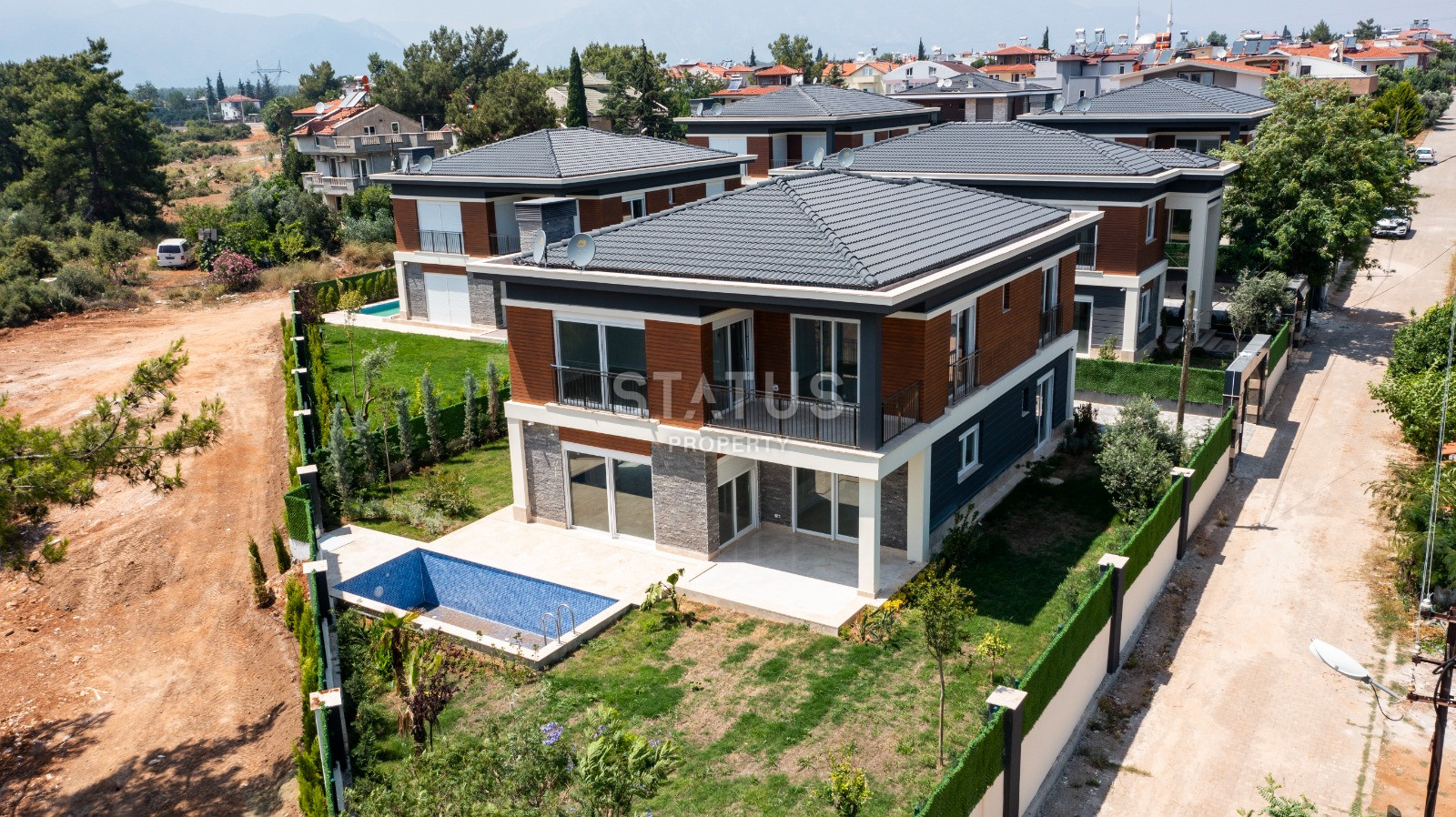 Комплекс вилл 4+1 в элитном районе Анталии Дошемеалты 350м2. фото 1