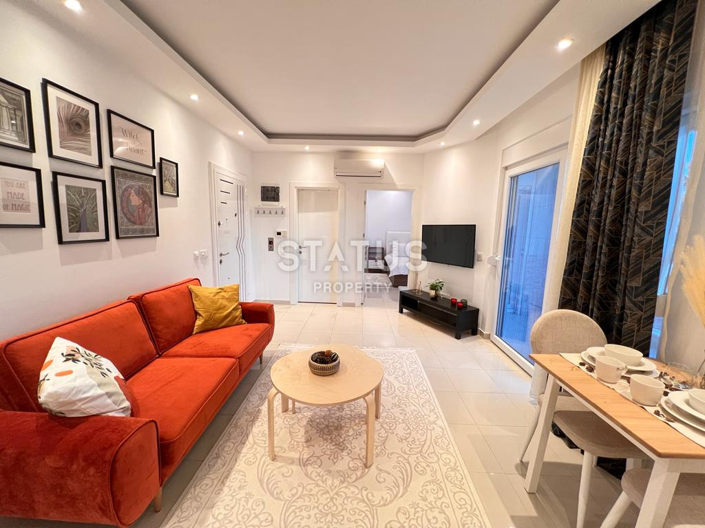 Двухкомнатные апартаменты от лидирующего застройщика в центре Алании в районе Оба, 60м2 фото 3