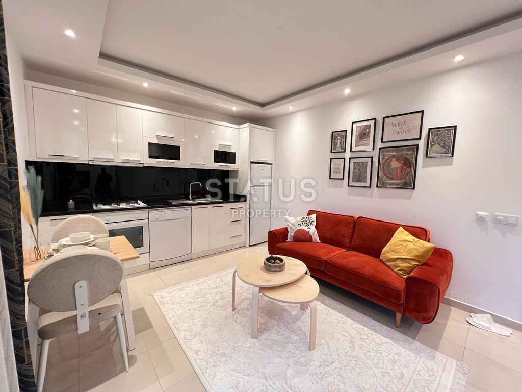 Двухкомнатные апартаменты от лидирующего застройщика в центре Алании в районе Оба, 60м2 фото 4