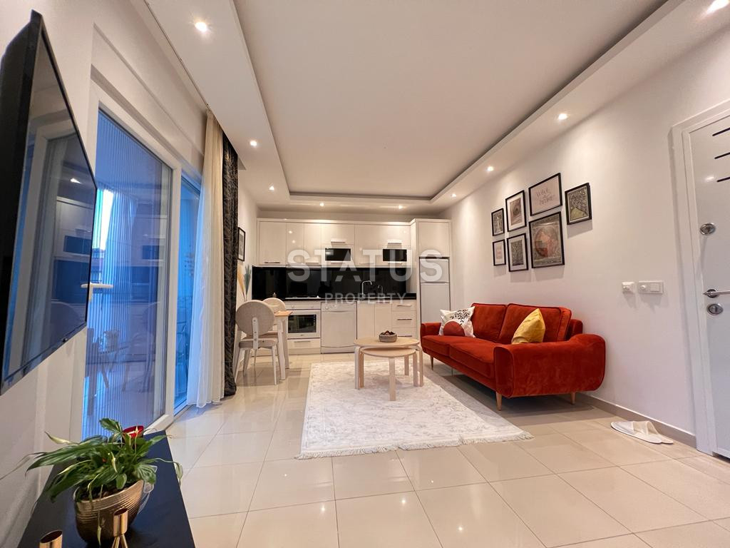 Двухкомнатные апартаменты от лидирующего застройщика в центре Алании в районе Оба, 60м2 фото 5