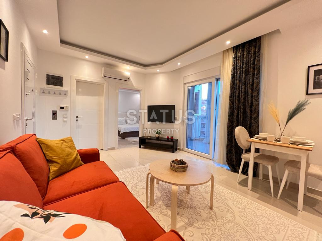 Двухкомнатные апартаменты от лидирующего застройщика в центре Алании в районе Оба, 60м2 фото 6