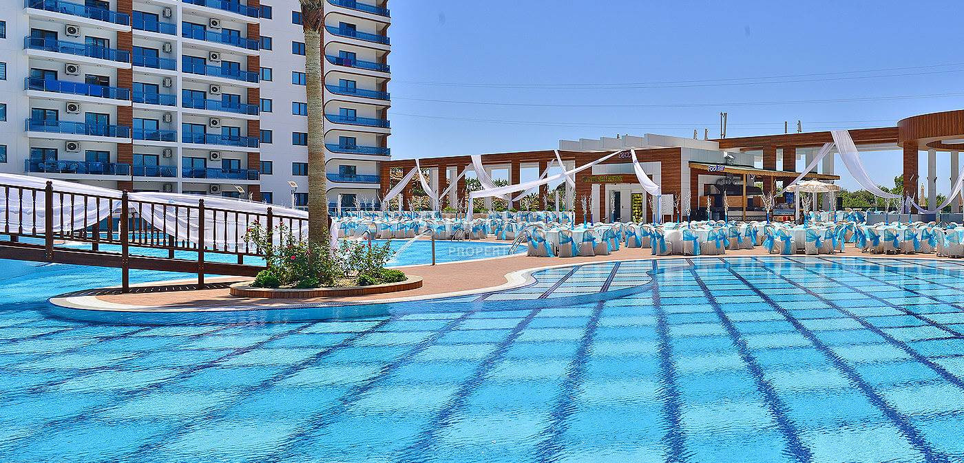 Апартаменты планировкой 1+1 в легендарном комплексе Алании в районе Махмутлар, 75 м2. фото 24