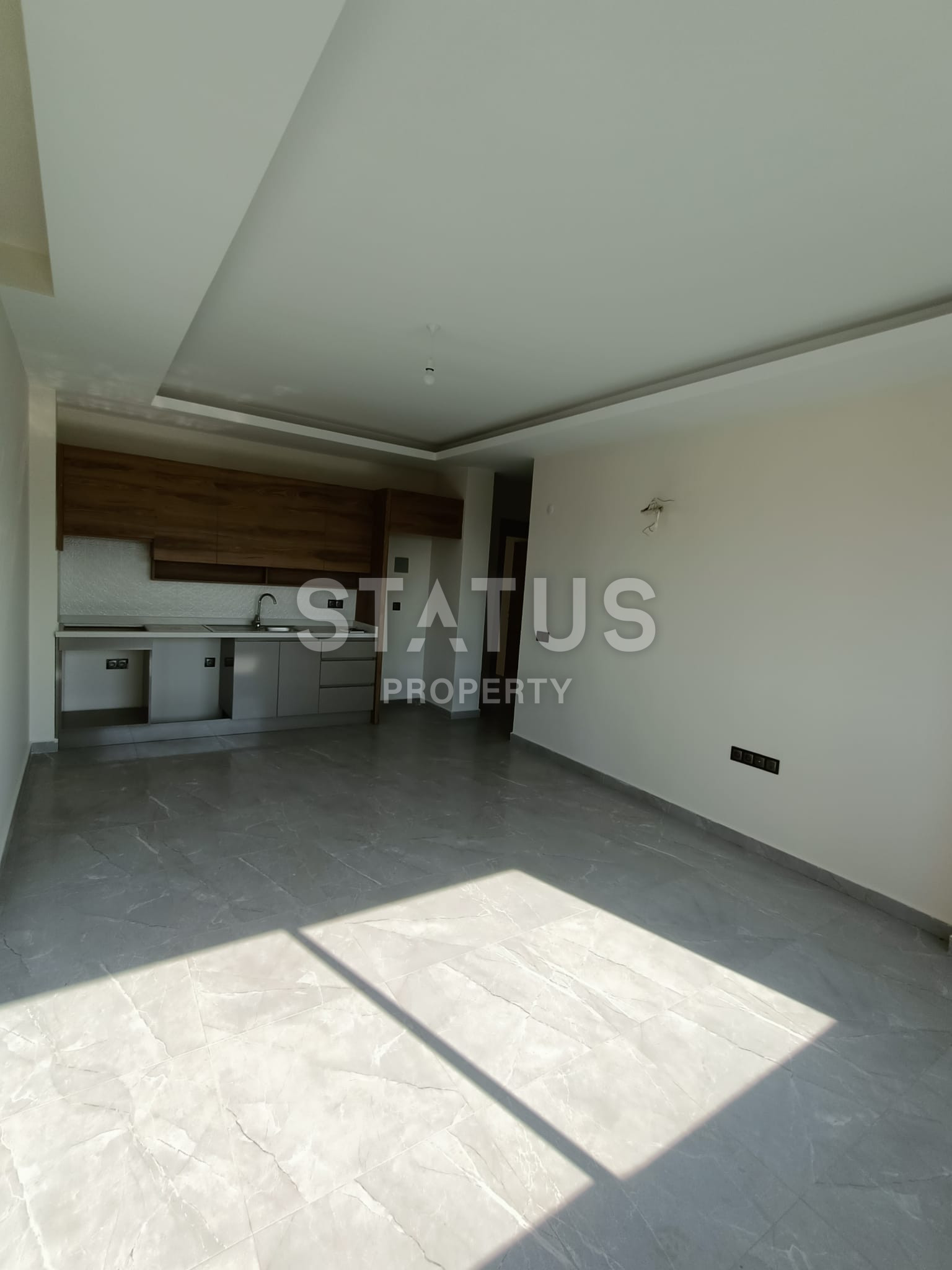 Просторная двухкомнатная квартира в новом доме в Махмутларе, 70 м2 фото 3