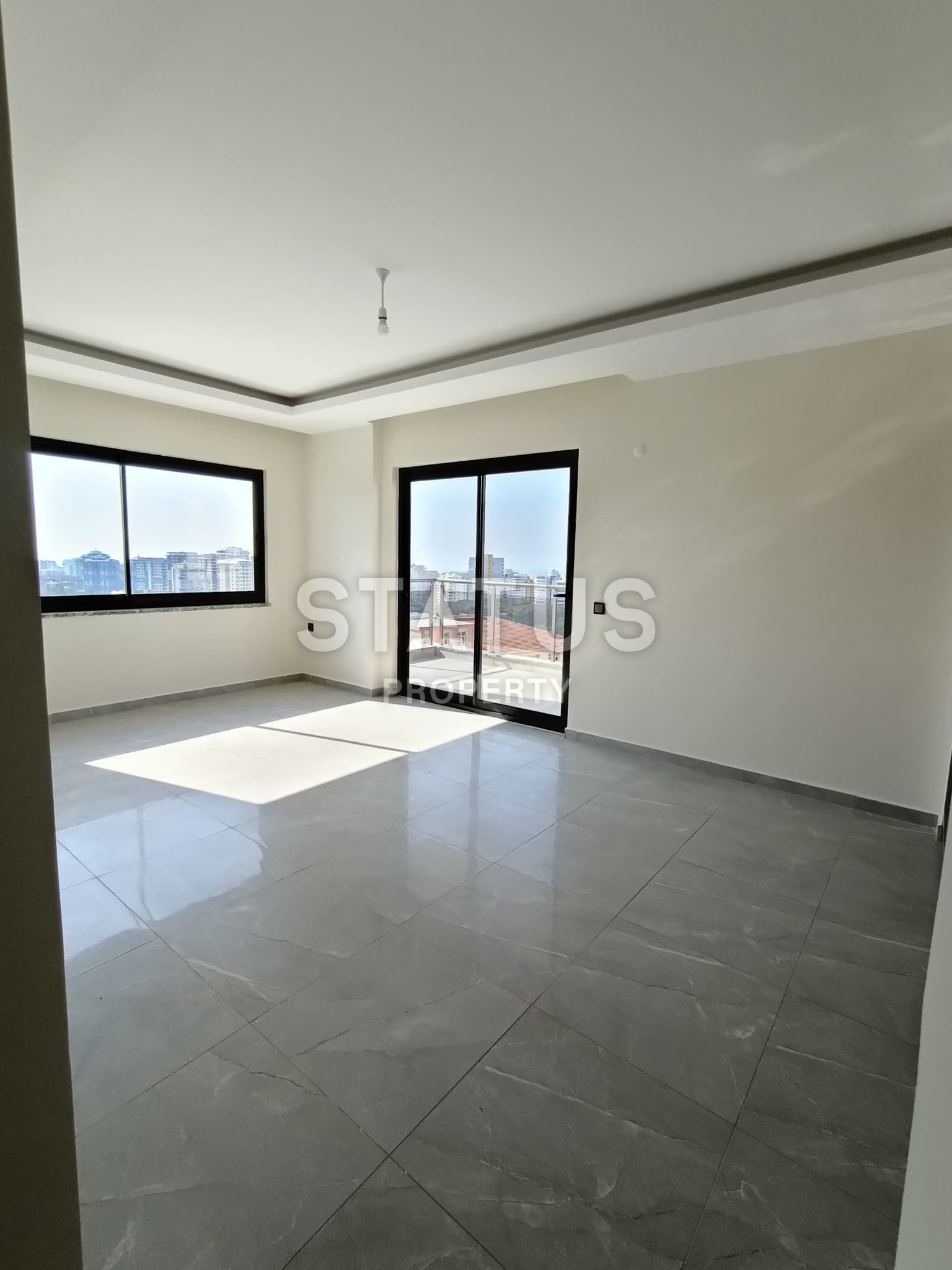 Просторная двухкомнатная квартира в новом доме в Махмутларе, 70 м2 фото 12