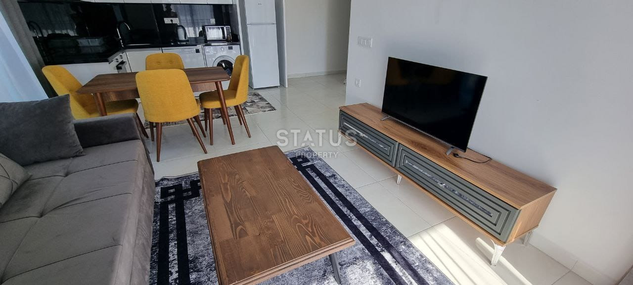 Две квартиры 1+1 в одном комплексе в Махмутларе! 56 м2 фото 2