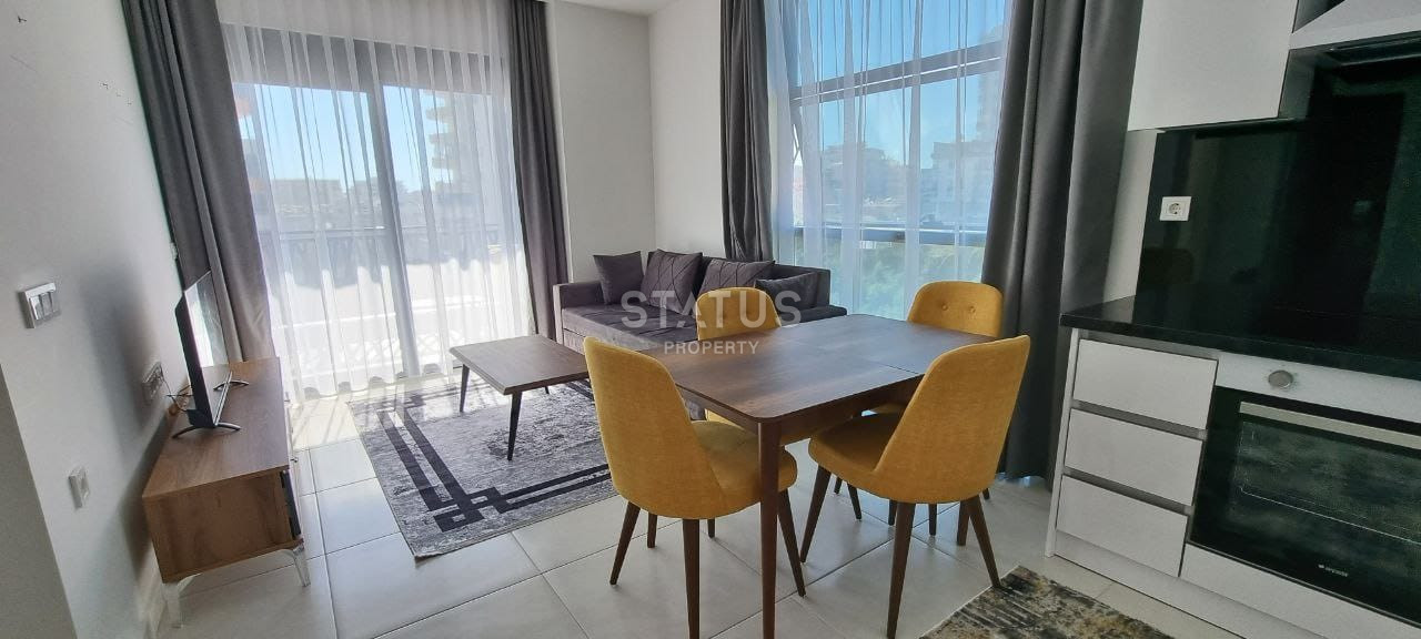 Две квартиры 1+1 в одном комплексе в Махмутларе! 56 м2 фото 3