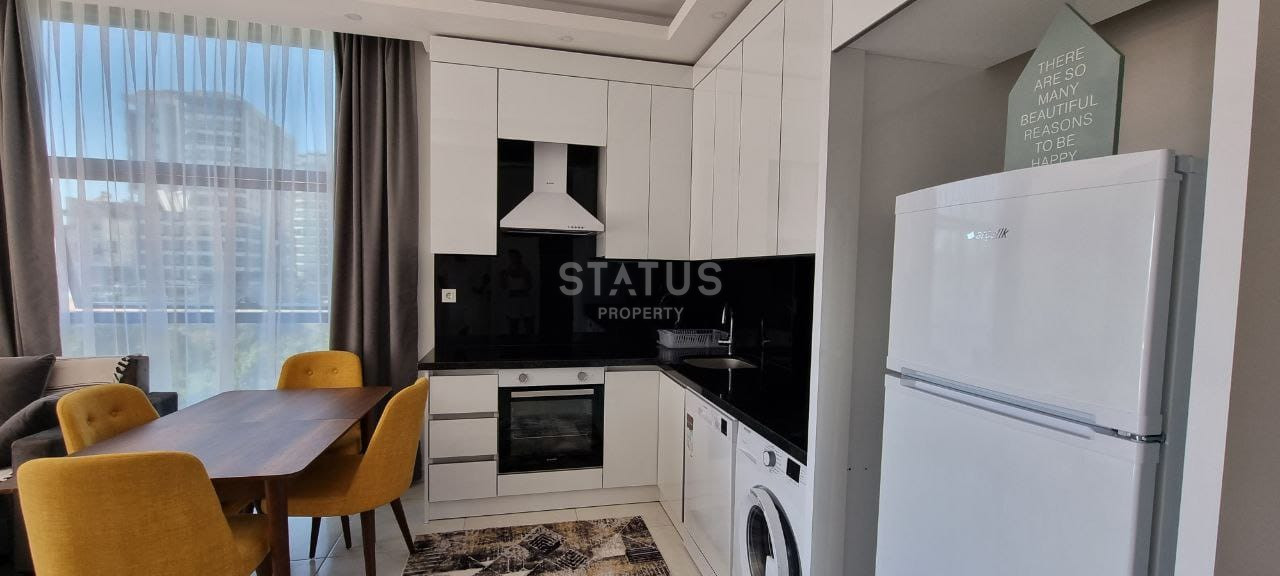 Две квартиры 1+1 в одном комплексе в Махмутларе! 56 м2 фото 4