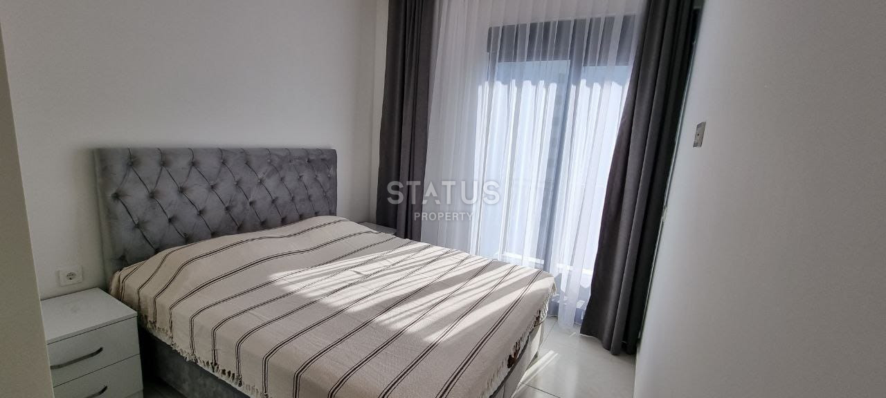 Две квартиры 1+1 в одном комплексе в Махмутларе! 56 м2 фото 5