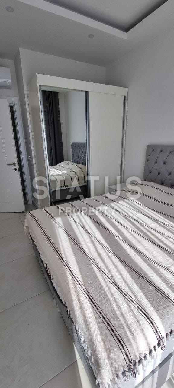 Две квартиры 1+1 в одном комплексе в Махмутларе! 56 м2 фото 6