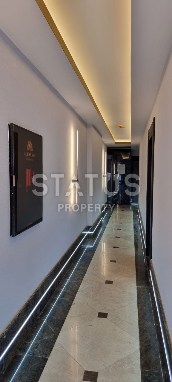 Две квартиры 1+1 в одном комплексе в Махмутларе! 56 м2 фото 8