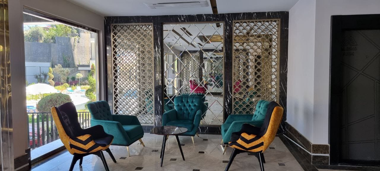 Две квартиры 1+1 в одном комплексе в Махмутларе! 56 м2 фото 11