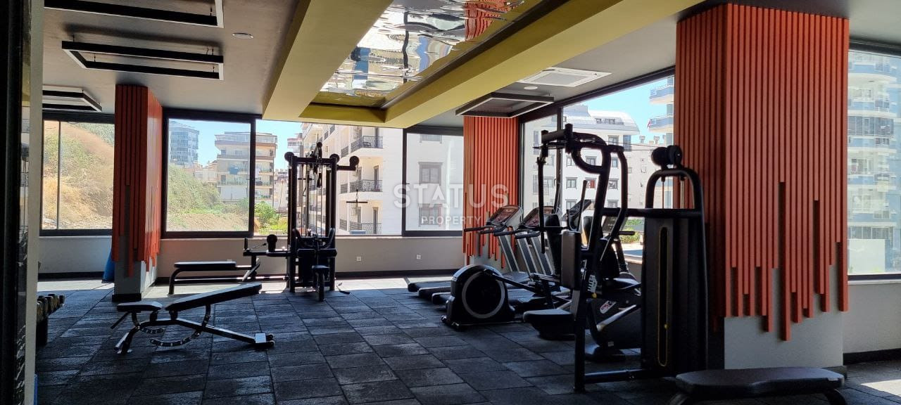 Две квартиры 1+1 в одном комплексе в Махмутларе! 56 м2 фото 12