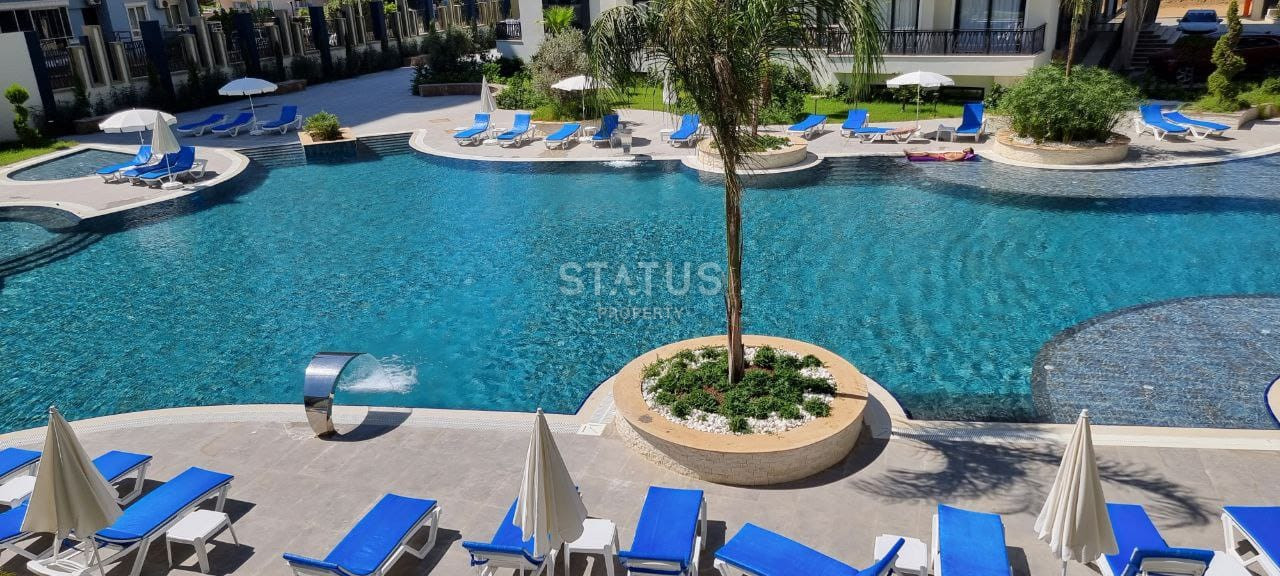 Две квартиры 1+1 в одном комплексе в Махмутларе! 56 м2 фото 15