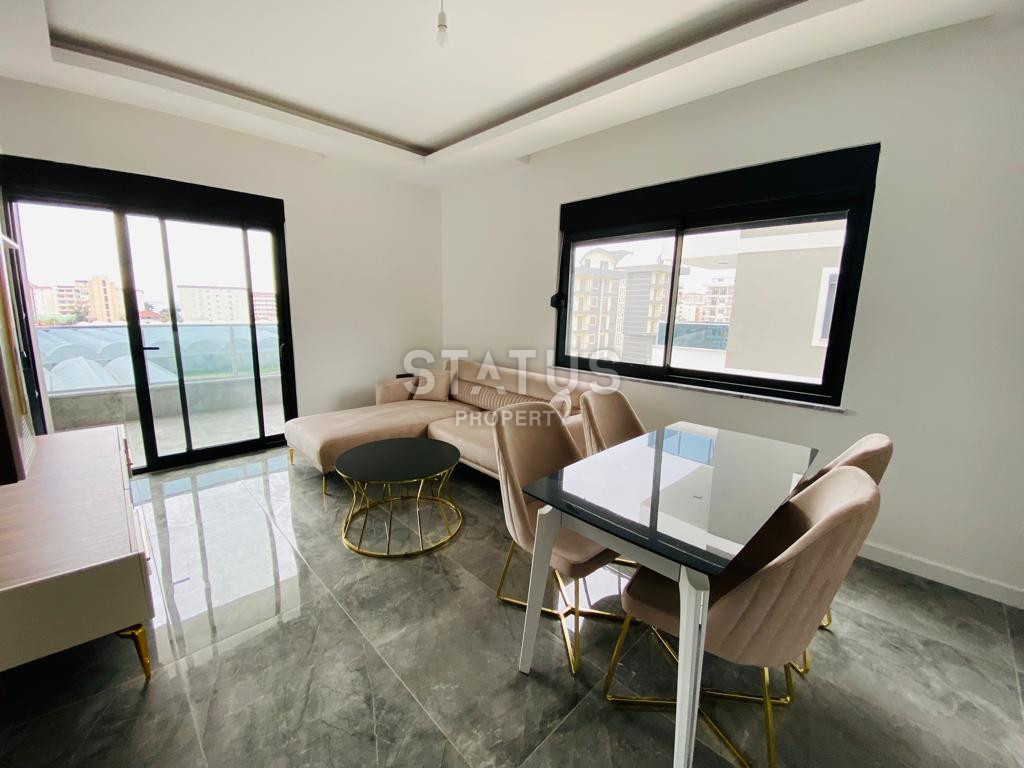 Двухкомнатные апартаменты в новом жилом комплексе в районе Каргыджак, 52м2 фото 4