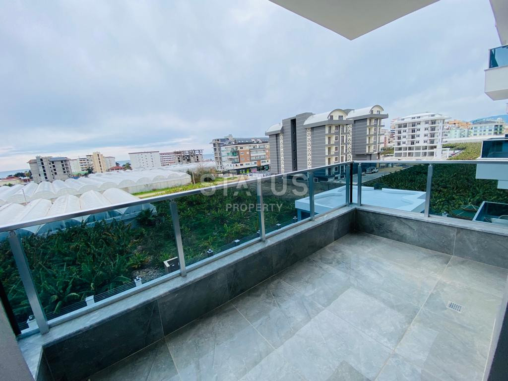 Двухкомнатные апартаменты в новом жилом комплексе в районе Каргыджак, 52м2 фото 12