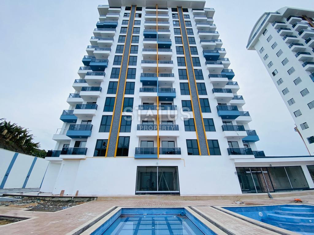 Две новые квартиры 1+1 в комплексе отельного типа в Махмутларе. 51м2 фото 2