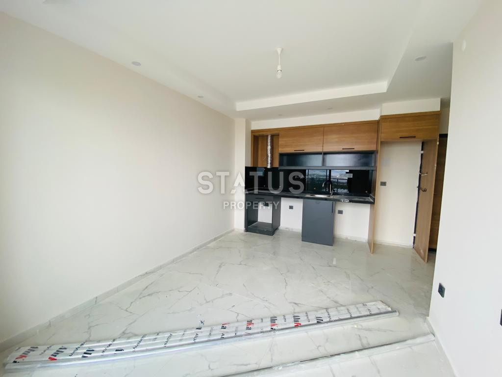 Две новые квартиры 1+1 в комплексе отельного типа в Махмутларе. 51м2 фото 5