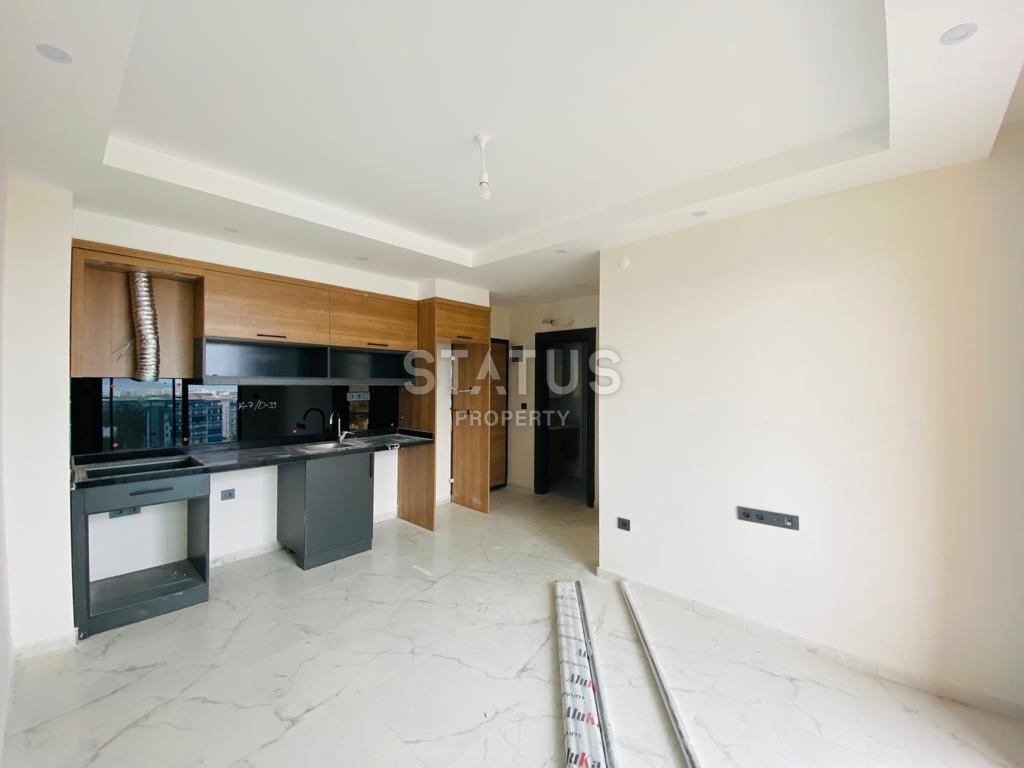 Две новые квартиры 1+1 в комплексе отельного типа в Махмутларе. 51м2 фото 6