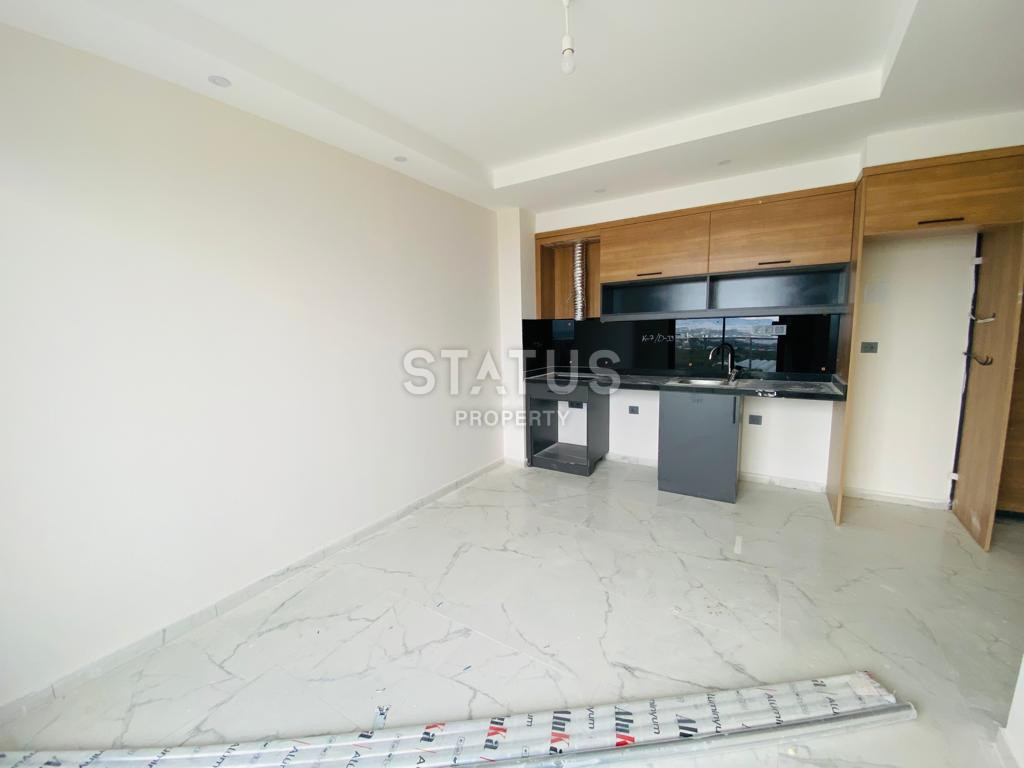 Две новые квартиры 1+1 в комплексе отельного типа в Махмутларе. 51м2 фото 10