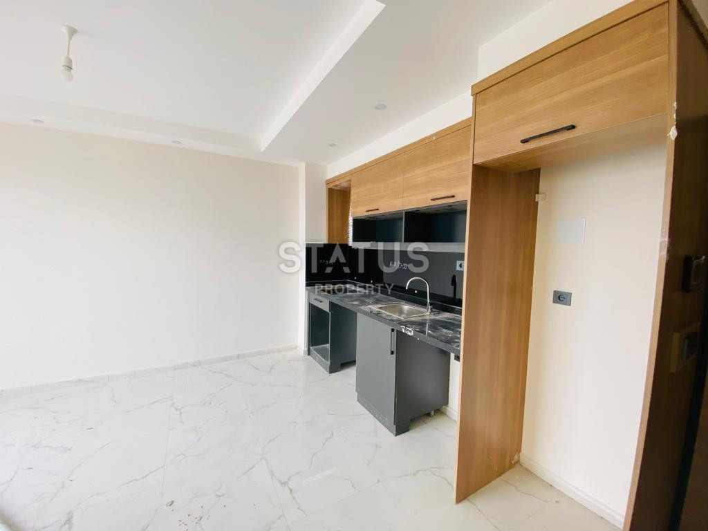 Две новые квартиры 1+1 в комплексе отельного типа в Махмутларе. 51м2 фото 11