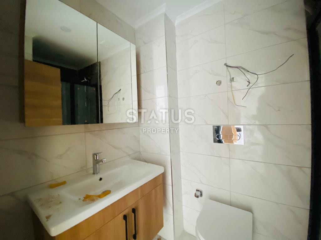 Две новые квартиры 1+1 в комплексе отельного типа в Махмутларе. 51м2 фото 12