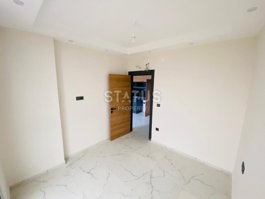 Две новые квартиры 1+1 в комплексе отельного типа в Махмутларе. 51м2 фото 13