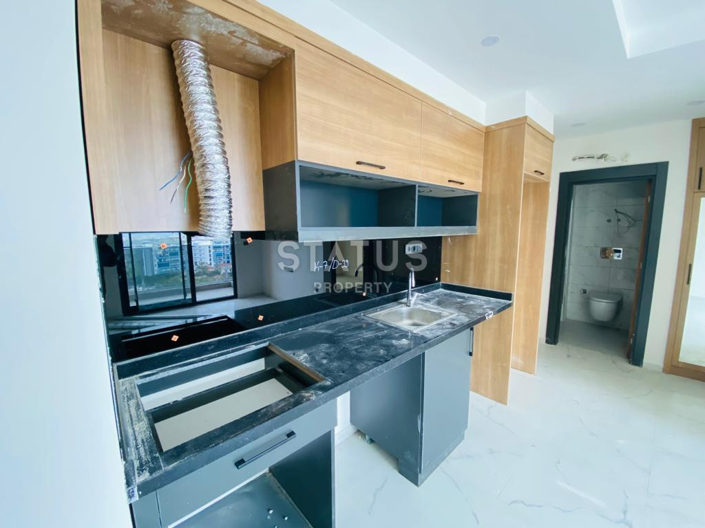 Две новые квартиры 1+1 в комплексе отельного типа в Махмутларе. 51м2 фото 14