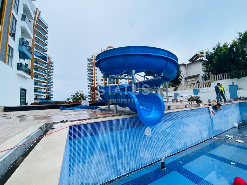 Две новые квартиры 1+1 в комплексе отельного типа в Махмутларе. 51м2 фото 22