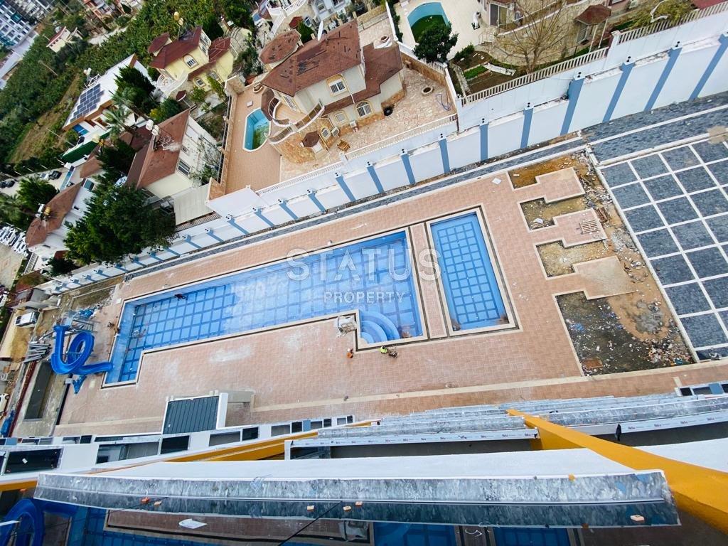 Две новые квартиры 1+1 в комплексе отельного типа в Махмутларе. 51м2 фото 26