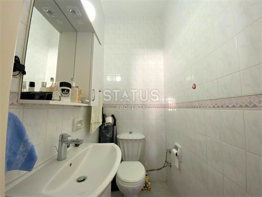 Просторная квартира с тремя спальнями в 50м от моря в районе Тосмур. 140м2 фото 11