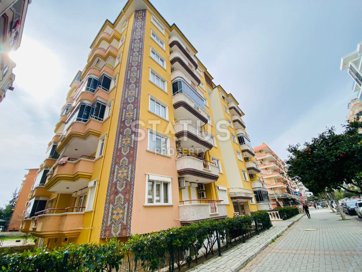 Квартира с двумя спальнями и отдельной кухней в 100м от моря в Махмутларе. 130м2 фото 1