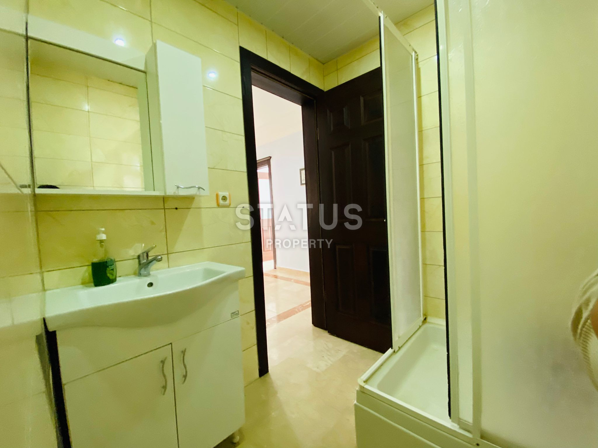 Apartment with two bedrooms and a separate kitchen, 100m from the sea in Mahmutlar. 130m2 фото 11