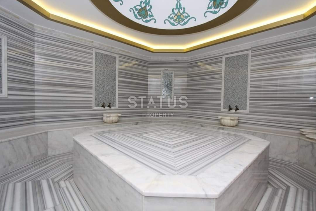 Two spacious bright turnkey apartments with two bedrooms in a residential complex from a leading developer 50m from the sea in Tosmur. 110m2 фото 19