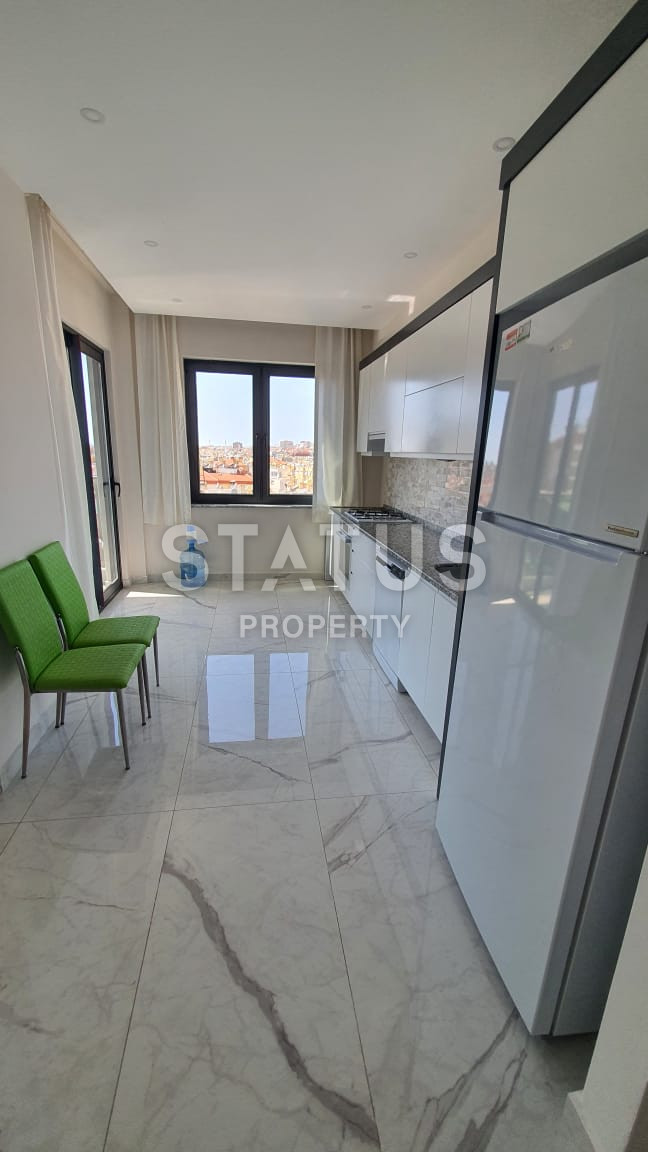 Просторная светлая трёхкомнатная квартира в центре Аланьи от ведущего застройщика в 5 минутах ходьбы от моря. 110м2 фото 4