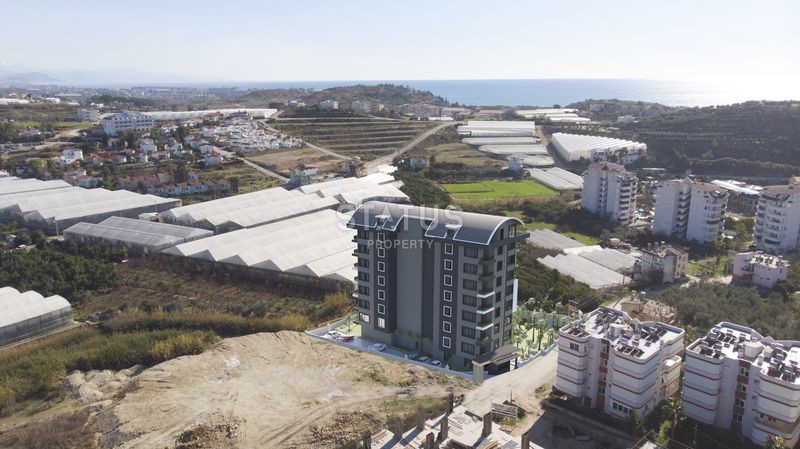 Достойный жилой комплекс с привлекательными ценами в 600м от моря в Авсалларе. 50м2 – 116м2 фото 9