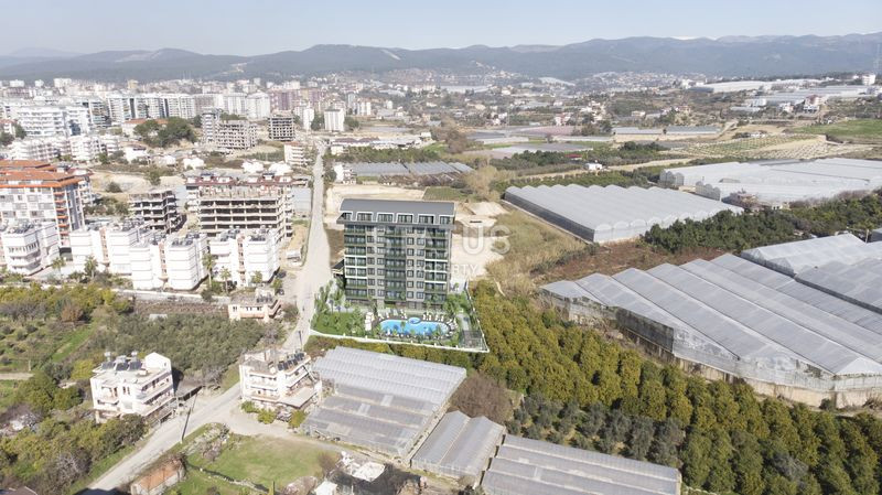 Достойный жилой комплекс с привлекательными ценами в 600м от моря в Авсалларе. 50м2 – 116м2 фото 10