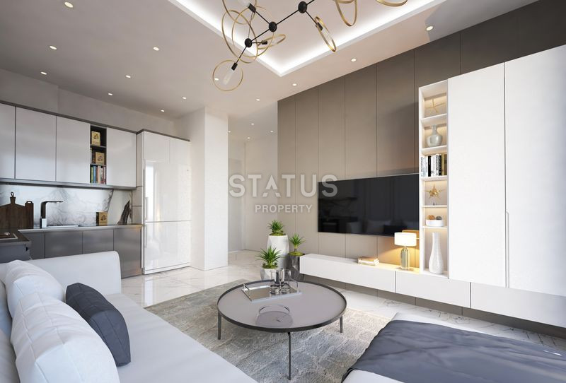 Достойный жилой комплекс с привлекательными ценами в 600м от моря в Авсалларе. 50м2 – 116м2 фото 21