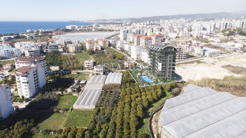 Достойный жилой комплекс с привлекательными ценами в 600м от моря в Авсалларе. 50м2 – 116м2 фото 35