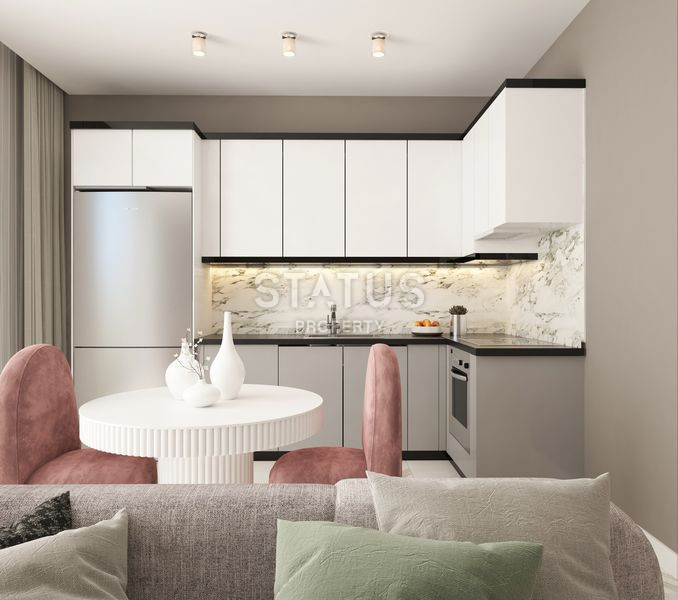 Отличные цены, трансфер до моря, премиальный жилой комплекс в открытом районе Конаклы, 50м2 – 100м2 фото 17