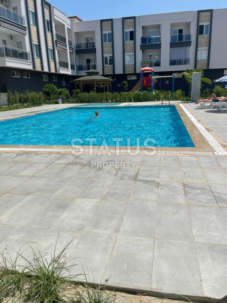 Двухкомнатная меблированная квартира в 200м от моря в открытом районе г. Аланья Конаклы. 55м2 фото 3