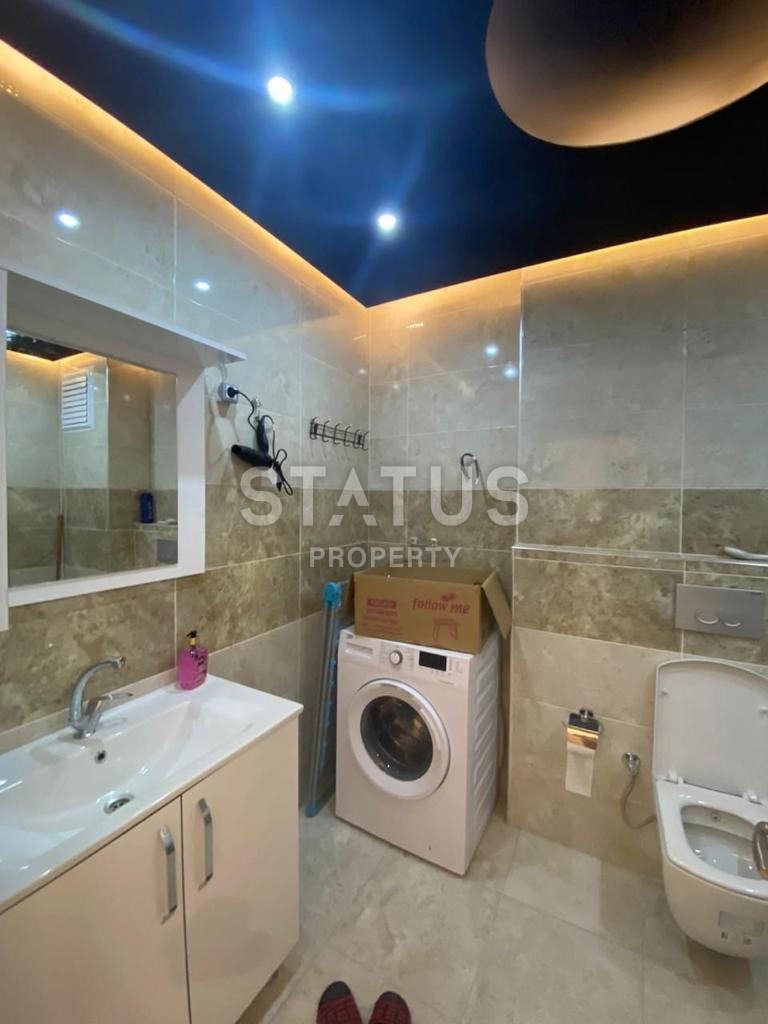 Двухкомнатная меблированная квартира в 200м от моря в открытом районе г. Аланья Конаклы. 55м2 фото 11