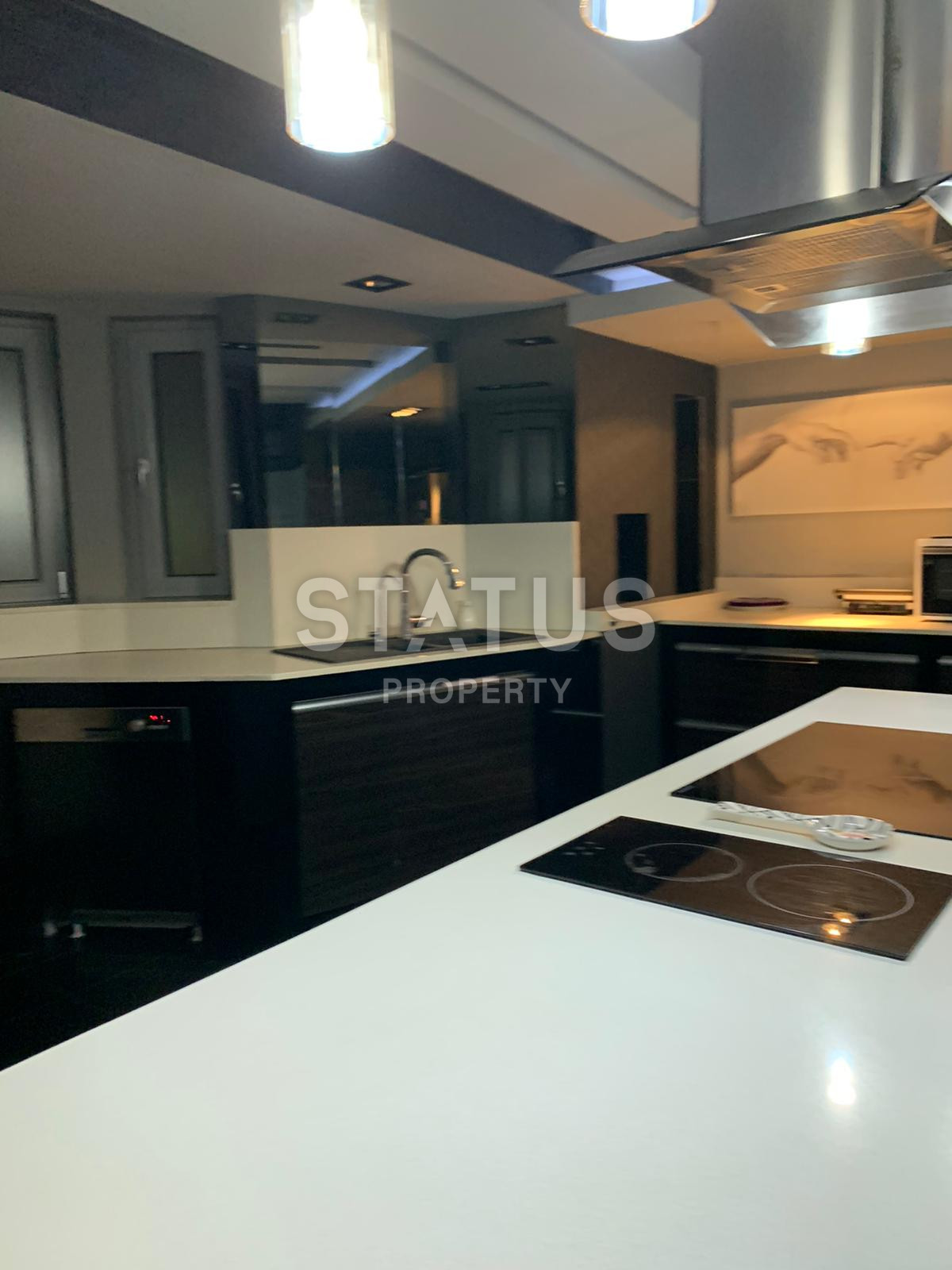 Дизайнерский дуплекс 5+1 с видом на море в спальном элитном районе Буюкхасбахче в центральной части Аланьи. 285м2 фото 5