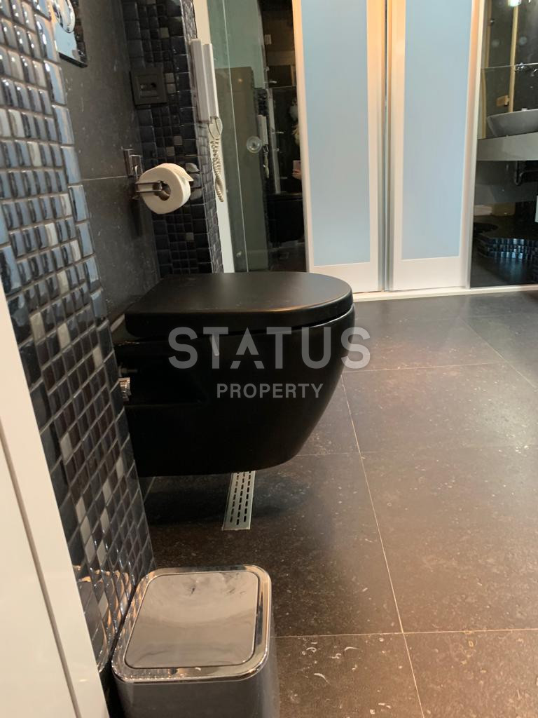 Дизайнерский дуплекс 5+1 с видом на море в спальном элитном районе Буюкхасбахче в центральной части Аланьи. 285м2 фото 12