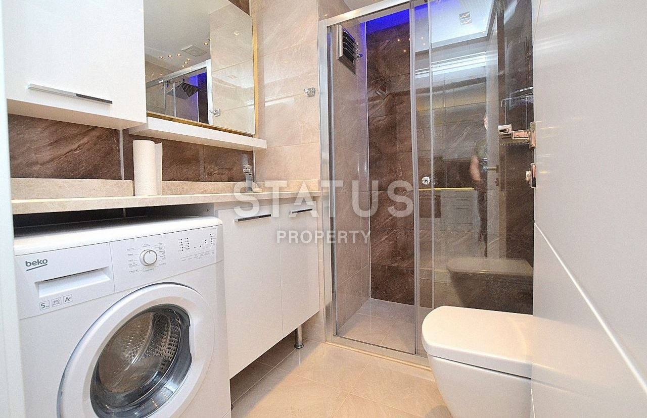 Современная квартира в новом доме в районе пляжа Кейкубат фото 3