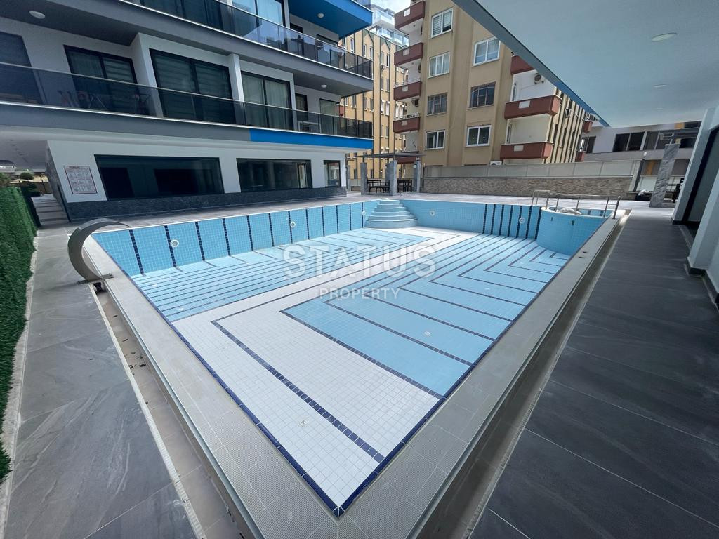 Three-room apartment 2+1 by the sea on the first coastline in Mahmutlar district, 95 m2. фото 22